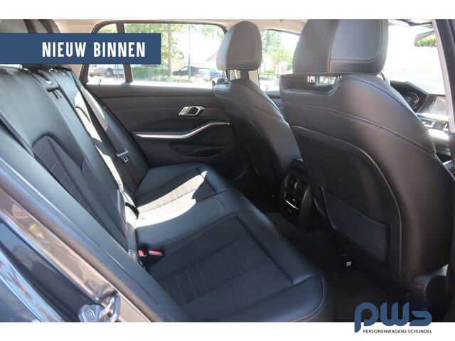 BMW 3-SERIE Touring 318i Business Edition Led / Cruise / Navi / Carplay / PDC / Leer / Clima / NL auto