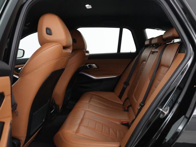 BMW 3-SERIE Touring 330e Business Edition Plus | SOH 88,3% | Leder | Stoelverwarming | | Carplay | Navigatie | Park assist | Sfeerverlichting | Elektrische achterklep