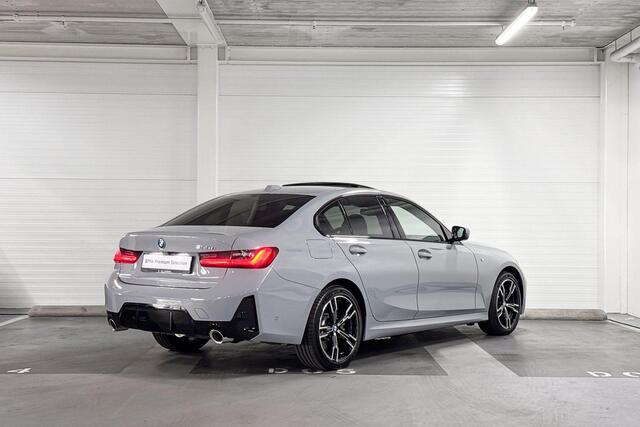BMW 3-SERIE Sedan 330e M Sport | Schuifdak | Trekhaak