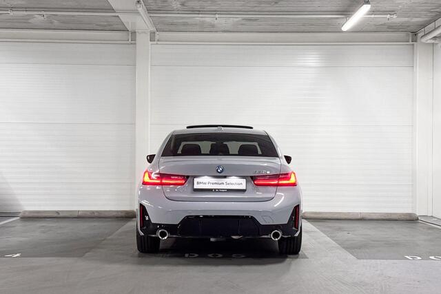 BMW 3-SERIE Sedan 330e M Sport | Schuifdak | Trekhaak