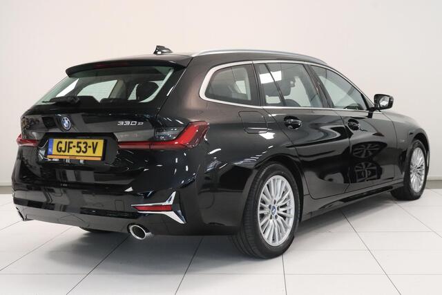 BMW 3-SERIE Touring 330e Business Edition Plus | Climate control | SoH 91,7% | Leder | Parkeersensoren | AppleCarplay AndroidAuto | Stoelverwarming | Elek achterklep |