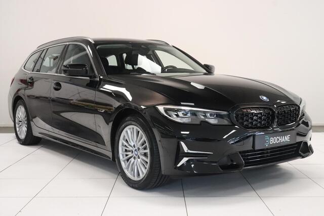 BMW 3-SERIE Touring 330e Business Edition Plus | Climate control | SoH 91,7% | Leder | Parkeersensoren | AppleCarplay AndroidAuto | Stoelverwarming | Elek achterklep |