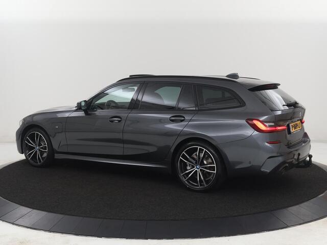 BMW 3-SERIE Touring 320e Business Edition Plus M-sport | 84,4% SOH | Panoramadak | Leder | Elektrische trekhaak | Camera | Park assist | Cruise control | Carplay | Sfeerverlichting |