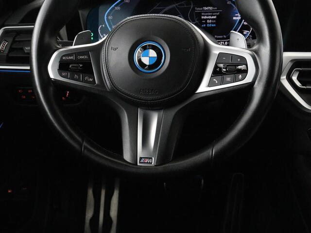 BMW 3-SERIE Touring 320e Business Edition Plus M-sport | 84,4% SOH | Panoramadak | Leder | Elektrische trekhaak | Camera | Park assist | Cruise control | Carplay | Sfeerverlichting |