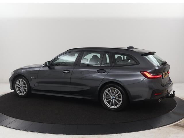 BMW 3-SERIE Touring 320e Business Edition Plus | SOH 84,2% | Leder | Cruise control | Stoelverwarming | Climate control | 3 zone klimaat | Navigatie | Bluetooth | Elektrische achterklep | Trekhaak