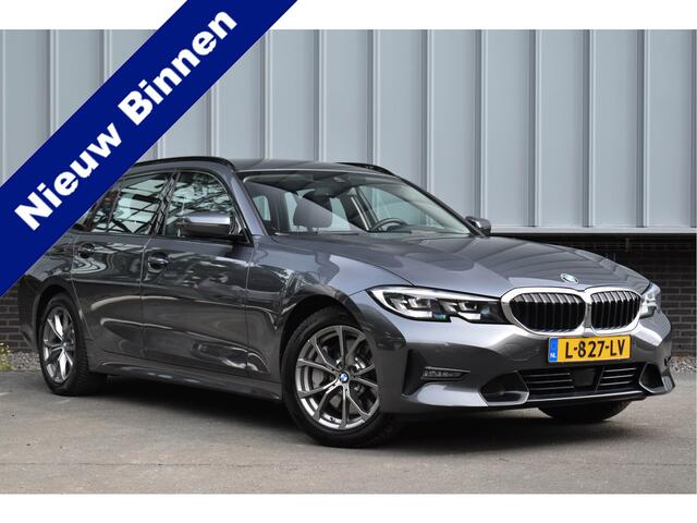 BMW 3-SERIE Touring 330i High Executive Aut. | Sfeerverl | Stoelverwarming | Navi | Deal. OH