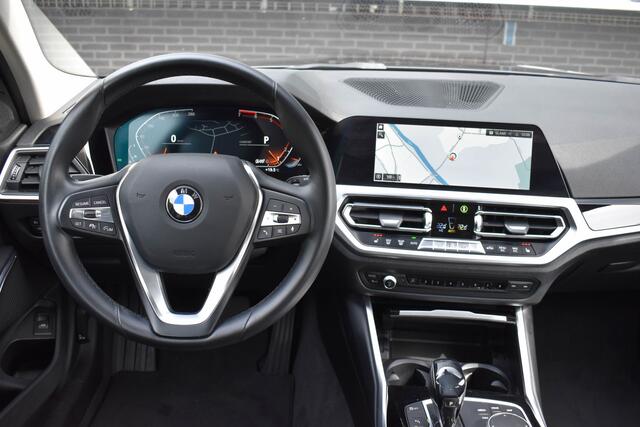 BMW 3-SERIE Touring 330i High Executive Aut. | Sfeerverl | Stoelverwarming | Navi | Deal. OH