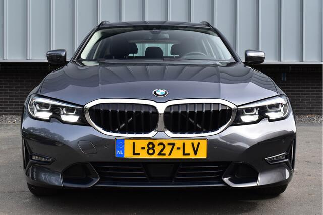 BMW 3-SERIE Touring 330i High Executive Aut. | Sfeerverl | Stoelverwarming | Navi | Deal. OH