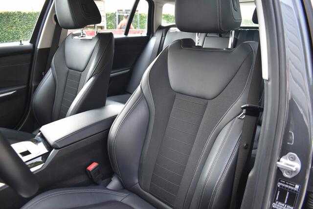 BMW 3-SERIE Touring 330i High Executive Aut. | Sfeerverl | Stoelverwarming | Navi | Deal. OH