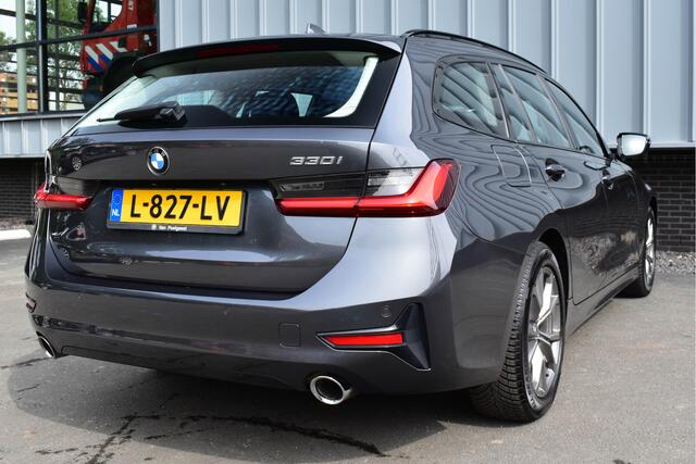 BMW 3-SERIE Touring 330i High Executive Aut. | Sfeerverl | Stoelverwarming | Navi | Deal. OH
