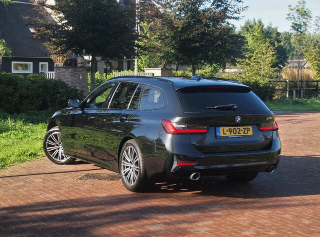 BMW 3-SERIE Touring 318i Business Edition Plus | Trekhaak | Camera | LED-Laser | Sfeerverlichting | Apple Carplay | NL-Auto |