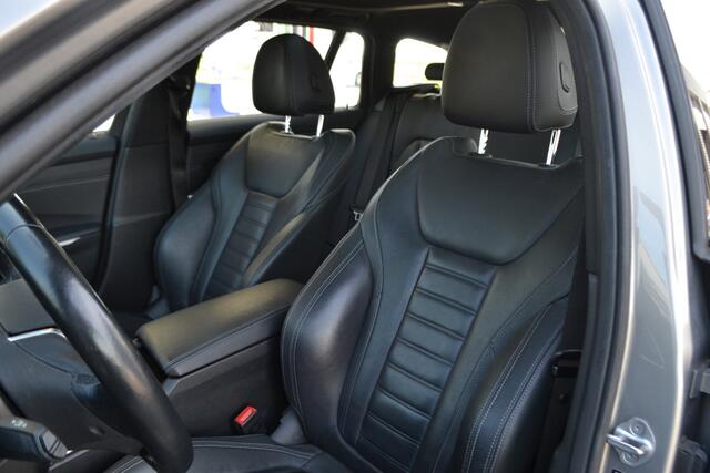 BMW 3-SERIE Touring Panoramadak | Leer | Sportstoelen | Trekhaak | Carplay | 320e Business Edition Plus