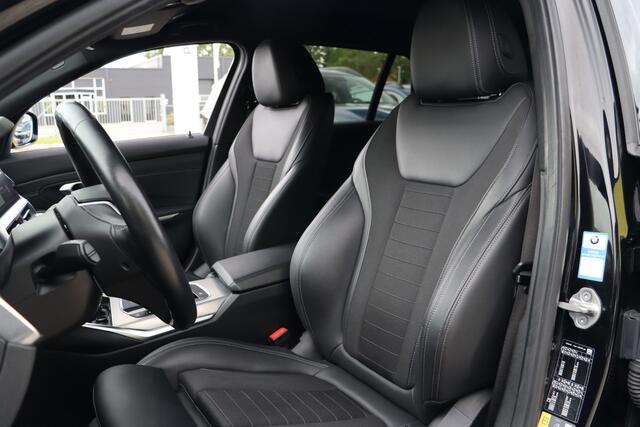 BMW 3-SERIE Touring 330e PHEV | Elek. Trekhaak | Camera | Stoelverwarming | LED | Navigatie