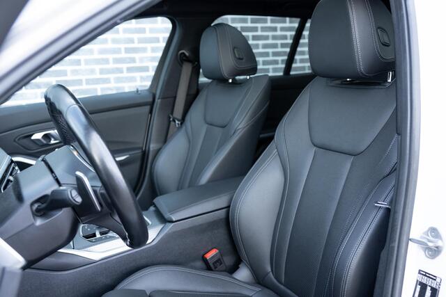 BMW 3-SERIE Touring 320e | M-Sport | Panoramadak | Trekhaak | Sportstoelen | Parkeersensoren | Lichtmetalen Velgen 18 inch | Stoelverwarming | Cruise Control Adaptief | Dodehoekdetectie | Live Cockpit Plus | Connected Professional | Plug-in Hybrid (PHEV)