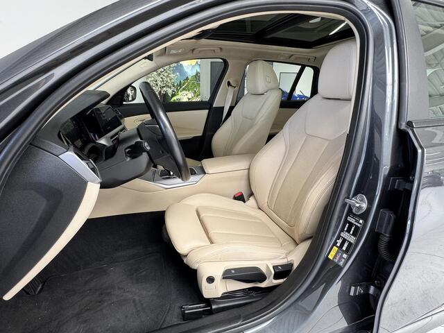 BMW 3-SERIE Touring 330e Business Edition Plus | Leder | Achteruitrijcamera | Panoramadak | Stoelverwarming |