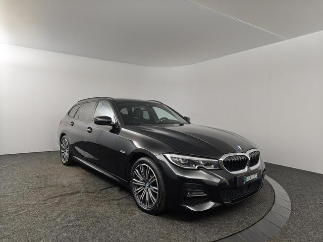 BMW 3-SERIE Touring 330e Business Edition Plus | ZWARTE HEMEL | WEGKLAPBARE TREKHAAK | NAVI PROF | SPORTSEATS