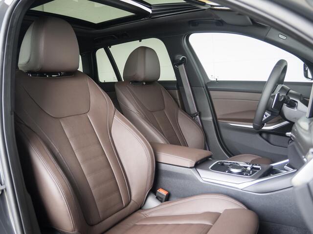 BMW 3-SERIE 330e Touring | M Sportpakket Pro | Driving Assistant Professional | Panoramadak | HIFI | 18 inch | Trekhaak