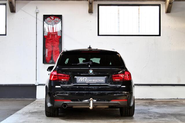 BMW 3-SERIE Touring 318i High Executive M Sport | 19" | HUD | Panoramadak | Trekhaak | NL Geleverd