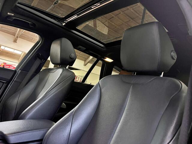 BMW 3-SERIE Touring 318i High Executive M Sport | 19" | HUD | Panoramadak | Trekhaak | NL Geleverd