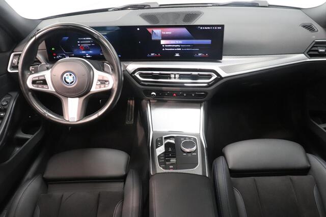 BMW 3-SERIE Touring 320e | M-Sport | Panoramadak | Memory | SoH 93,7% | Shadow line | Navigatie | AppleCarplay AndroidAuto | Cruise |