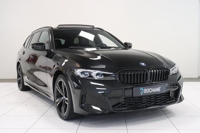 BMW 3-SERIE Touring 320e | M-Sport | Panoramadak | Memory | SoH 93,7% | Shadow line | Navigatie | AppleCarplay AndroidAuto | Cruise |