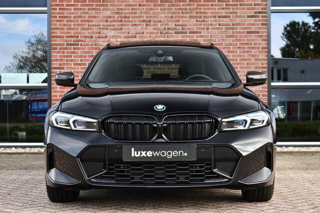 BMW 3-SERIE Touring 330e xDrive LCI-2 Pano El-zetels HUD 360-cam Trekhaak