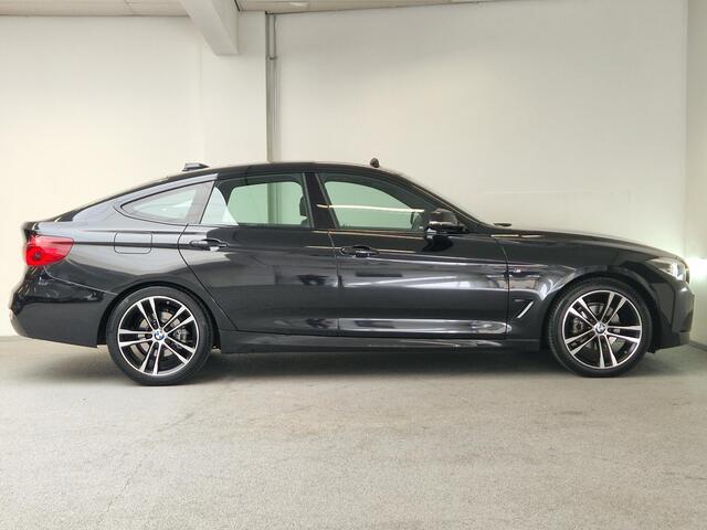 BMW 3-SERIE GT Gran Turismo 320i M-sport | ORG.NL | PANO | TREKHAAK | HEAD-UP |