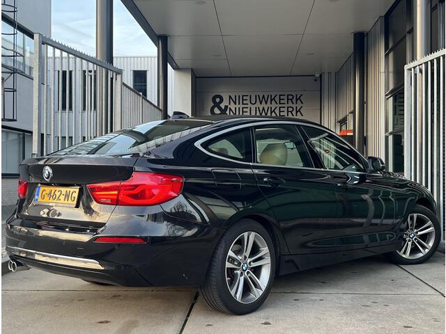 BMW 3-SERIE GT Gran Turismo 320i Corporate Lease High Executive | AUTOMAAT | SCHUIF/KANTELDAK | LEDER | CARPLAY/ANDROID | CAMERA | NAVI | CRUISE CONTROL | LMV 18'' | CLIMATE CONTROL | PDC V+A | STOELVERWARMING | KEYLESS | ELEKTR. ACHTERKLEP | BLUETOOTH