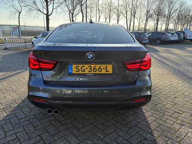 BMW 3-SERIE GT Gran Turismo 320i 8-traps Automaat High Executive | Navigatie | Panorama-Dak | Leder | ECC | 19" LM-Velgen | Camera | Parkpilot | M Pakket | Set winterbanden LMV