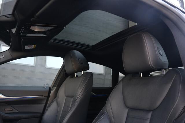 BMW 4-SERIE Gran Coupé M440i xDrive High Executive M Sport Schuifdak HUD LaserLed Dravitgrau ACC 360 Camera