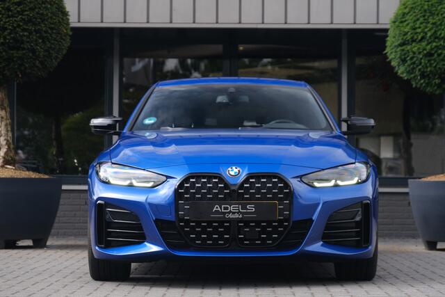 BMW 4-SERIE Gran Coupé M440i xDrive High Executive Portimao Blauw Carbon Harman Kardon