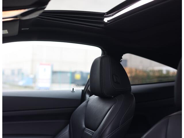 BMW 4-SERIE Coupé 420i | M-Sport - HUD - Schuifdak