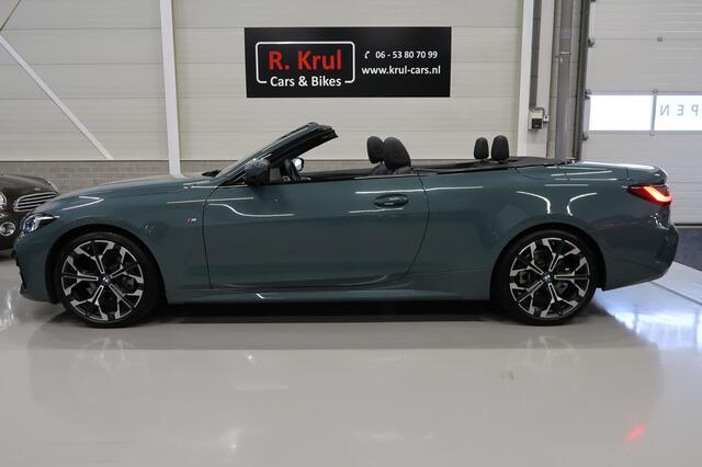 BMW 4-SERIE Cabrio 420i High Executive M-Sport Sportstoelen Camera Stoelverwarming Curved dashboard Navigatie Airco-ecc 19 inch Sportvelgen App connect Cape York Green metallic Zwart sportleer