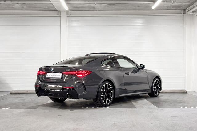 BMW 4-SERIE Coupé 420i High Executive | M-Sport Pro | Schuif-/kanteldak | Harman/Kardon | Stoelverwarming