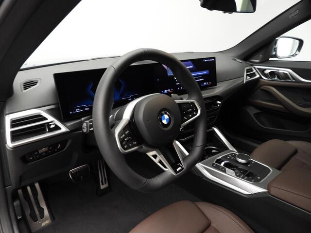 BMW 4-SERIE Gran Coupé 420i | M Sportpakket Pro | Schuif-/kanteldak | Harman Kardon | Stuurwielrand verwarmd