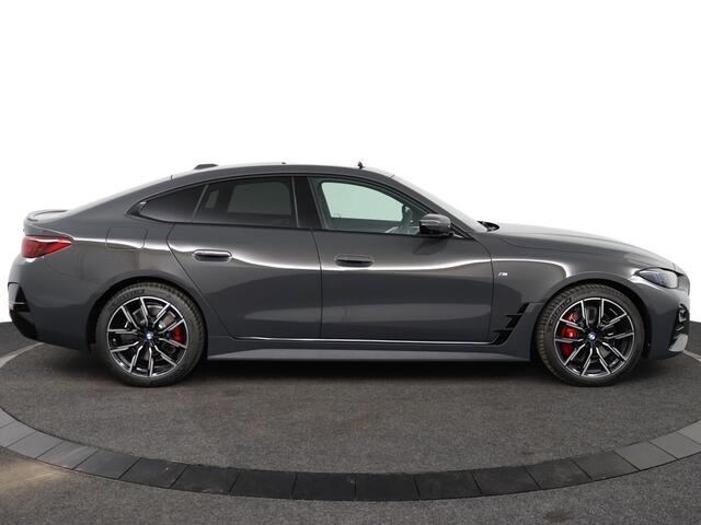 BMW 4-SERIE Gran Coupé 420i | M Sportpakket Pro | Schuif-/kanteldak | Head-Up Display | Active Cruise Control | Trekhaak |