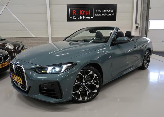 BMW 4-SERIE Cabrio 420i High Executive M-Sport Sportstoelen Camera Curved dash Navigatie Airco-ecc 19 inch Sportvelgen App connect Cape York Green metallic Zwart sportleer