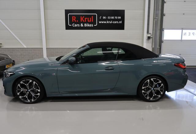 BMW 4-SERIE Cabrio 420i High Executive M-Sport Sportstoelen Camera Curved dash Navigatie Airco-ecc 19 inch Sportvelgen App connect Cape York Green metallic Zwart sportleer