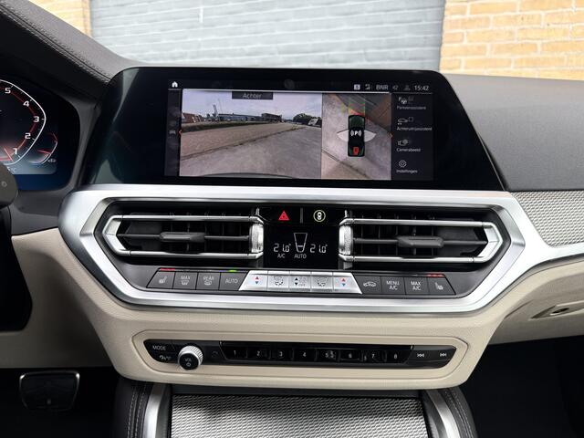BMW 4-SERIE Cabrio M440i xDrive l Trekhaak l Head-Up l Driving Assist Prof l Nekverwarming l Top View