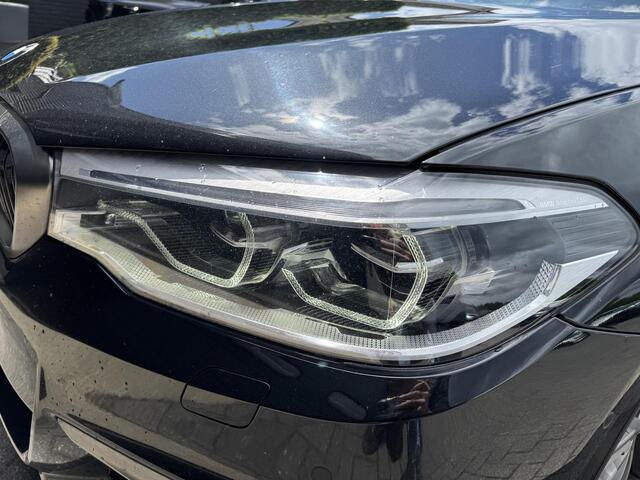 BMW 5-SERIE Touring M550d xDrive High Executive | Panoramadak | Head-Up Display | Harmon Kardon | Elektrische Trekhaak |