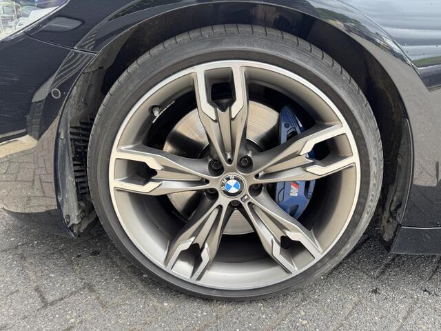 BMW 5-SERIE Touring M550d xDrive High Executive | Panoramadak | Head-Up Display | Harmon Kardon | Elektrische Trekhaak |