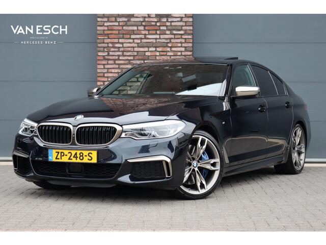 BMW 5-SERIE M550d xDrive High Executive | Schuifdak | Bowers&Wilkins | ACC | Trekhaak | Entertainment Achter | Parfumering | Stoelventilatie | HUD | Massage | Standverwarming | Zonnerollo's | Display Key | Aerodynamicapakket |
