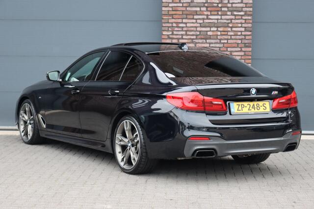 BMW 5-SERIE M550d xDrive High Executive | Schuifdak | Bowers&Wilkins | ACC | Trekhaak | Entertainment Achter | Parfumering | Stoelventilatie | HUD | Massage | Standverwarming | Zonnerollo's | Display Key | Aerodynamicapakket |