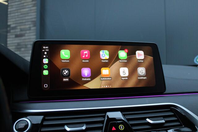 BMW 5-SERIE Touring 520e High Executive - Laser - Memory - HUD - Achteras besturing - Stoel/Stuur verwarming - ACC - Keyless - Rijklaar