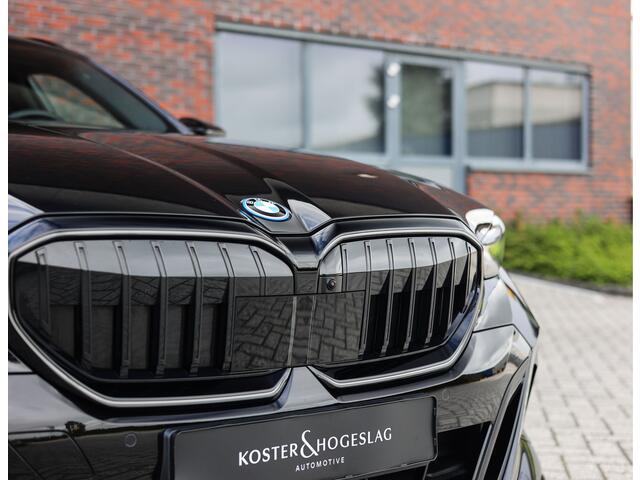BMW 5-SERIE Touring 550e xDrive | M Performance - Pano - Trekhaak