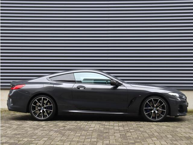 BMW 8-SERIE Coupé M850i xDrive | High Executive | M Sport | Driving Assistant Prof. | Carbon Exterieur Pack | Bowers & Wilkins | Adaptief M Onderstel | Laserlight | Active Steering | Parking Assistant Plus | 20'' LMV