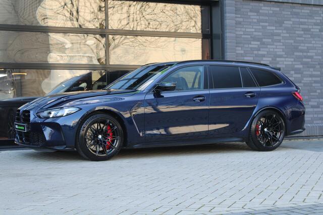 BMW M3 3-serie Touring xDrive Competition | NIEUWSTAAT! | HUD | H&K | MEMORY | CARBON | KEYLESS |