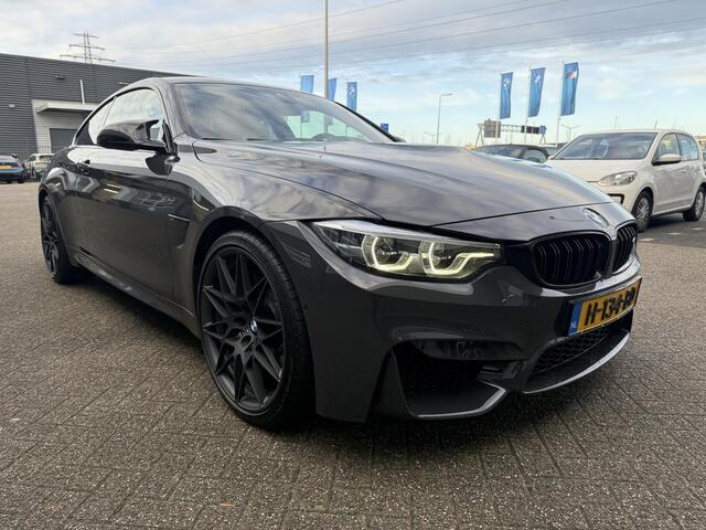 BMW M4 4-serie Coupé Competition | Keramische remmen | M-Drivers Pack | Individual Dravitgrau | Head-Up | Harman Kardon | Elektrisch bediende stoelen | Comfort Access | 360 Camera | Stoelverwarming | Carbon interieur | Prof. navi | Draadloze telefoonlader | Zonn