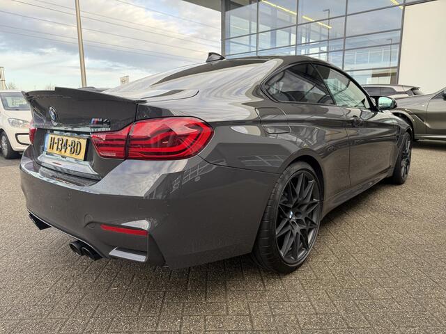BMW M4 4-serie Coupé Competition | Keramische remmen | M-Drivers Pack | Individual Dravitgrau | Head-Up | Harman Kardon | Elektrisch bediende stoelen | Comfort Access | 360 Camera | Stoelverwarming | Carbon interieur | Prof. navi | Draadloze telefoonlader | Zonn