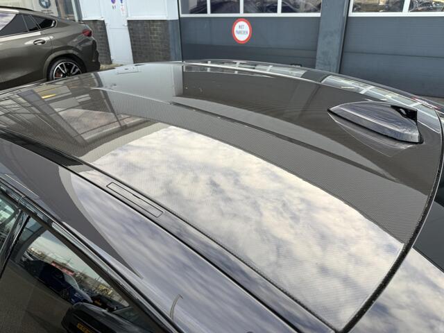 BMW M4 4-serie Coupé Competition | Keramische remmen | M-Drivers Pack | Individual Dravitgrau | Head-Up | Harman Kardon | Elektrisch bediende stoelen | Comfort Access | 360 Camera | Stoelverwarming | Carbon interieur | Prof. navi | Draadloze telefoonlader | Zonn